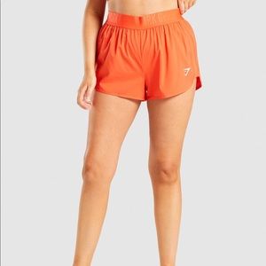 Gymshark Loose Training Short in Neon Orange